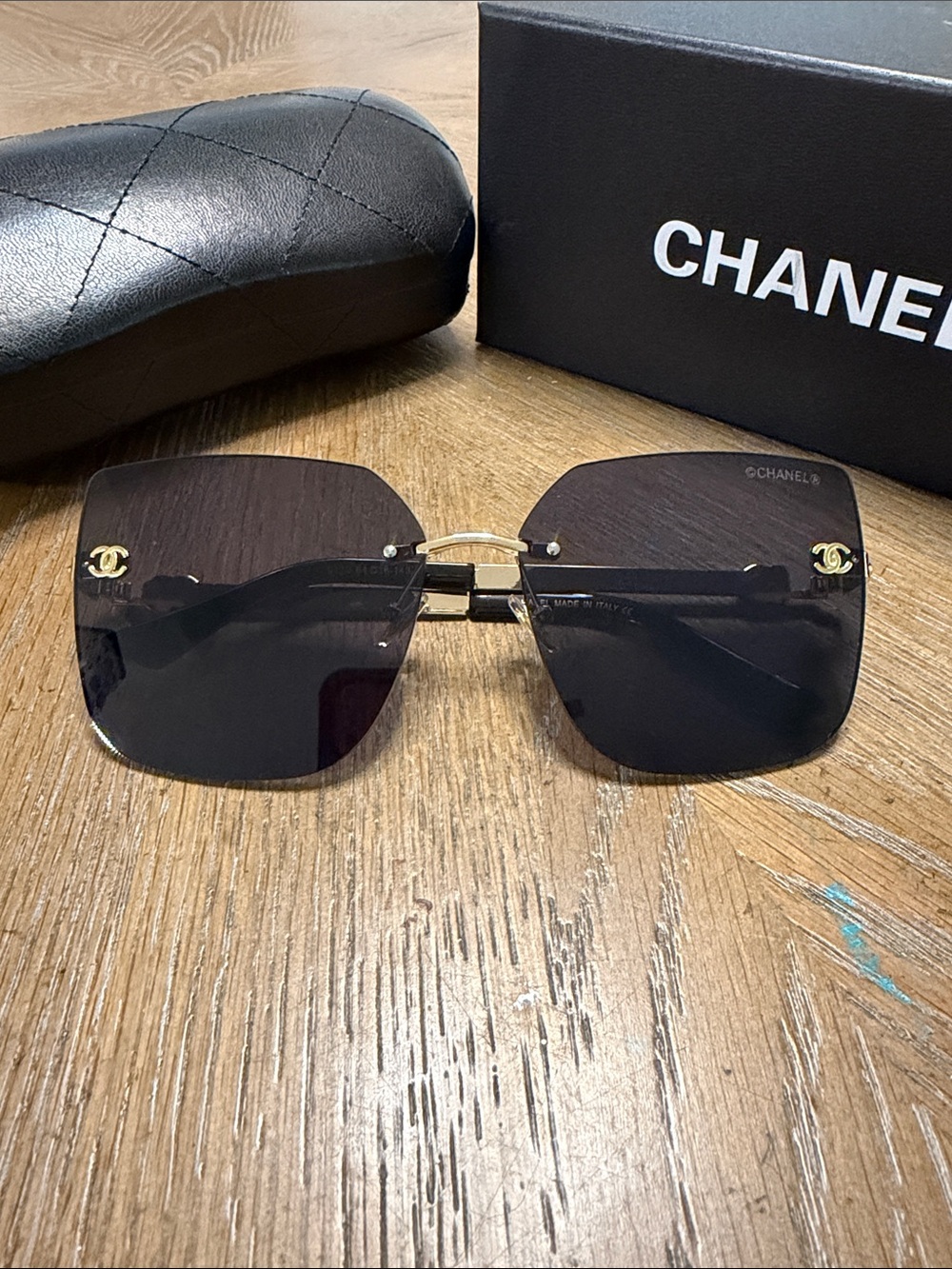CHANEL Gold Accent Black Gradient Rimless Square Sunglasses